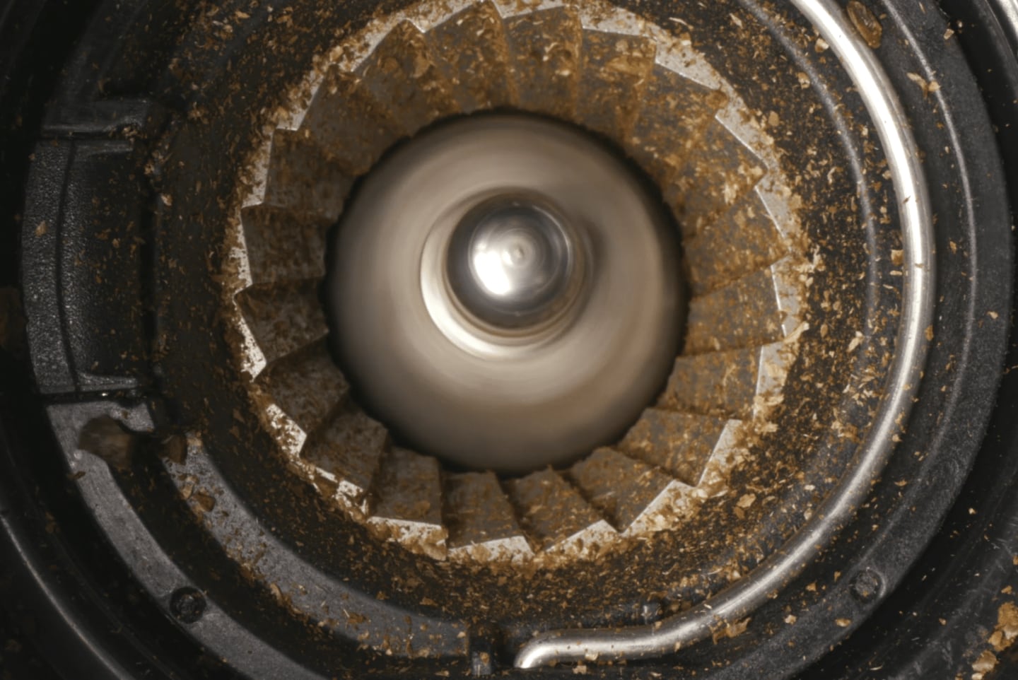 Close-up of a burr coffee grinder Close-up of a burr coffee grinder